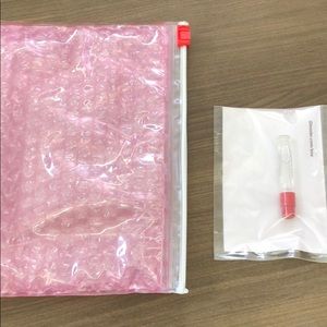 Pink Glossier bag (small) and Glossier You sample